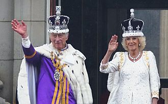 King Charles III and Queen Camilla during the coronation procession in the Gold State Coach.
